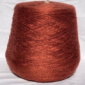 cone of copper orange yarn